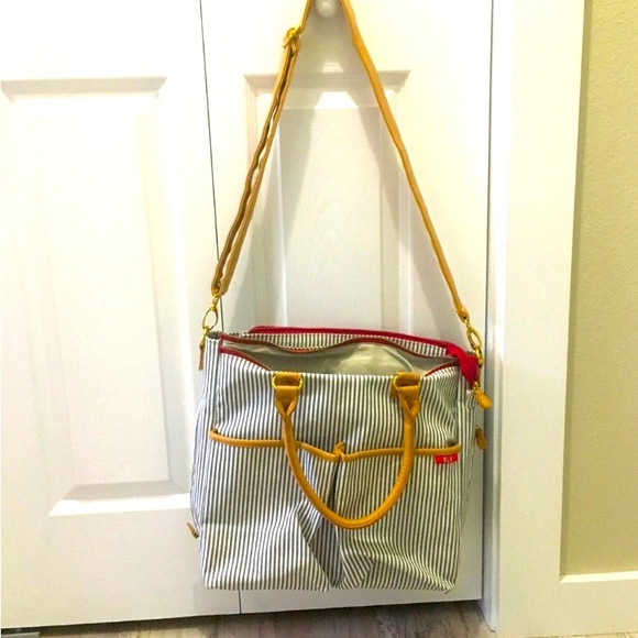 Gray and white striped Satchel
14” x 15” x 4 1/2” - Picture 1 of 12